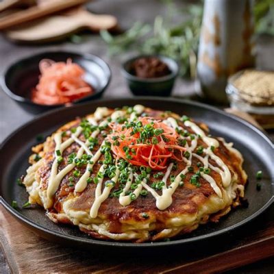  Okonomiyaki: Una deliziosa torta salata giapponese con un aroma irresistibile e una consistenza sorprendentemente morbida!